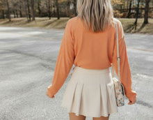Sweatshirt & Pleated Mini Skirt
